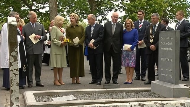 Prince Charles and Camilla speak to Mary McAleese at the grave of WB Yeats