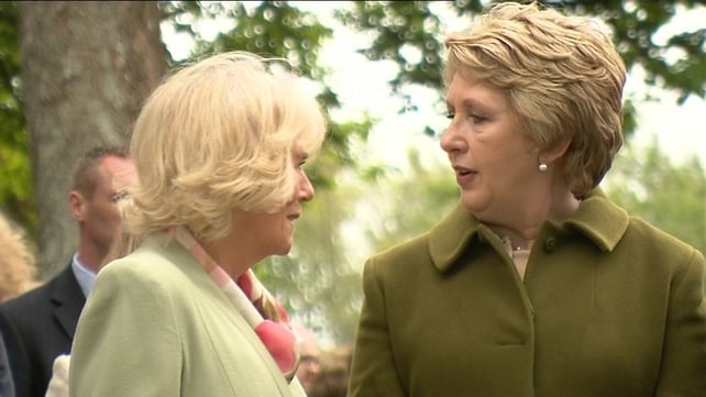 Camilla and Mary McAleese visit WB Yeats' grave in the grounds of the church