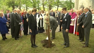 Prince Charles and his wife plant a tree outside St Columba's Church in Drumcliffe