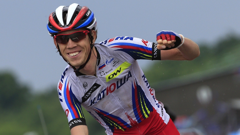 Ilnur Zakarin (Katusha) celebrates as he crosses the finish line to win the 11th stage