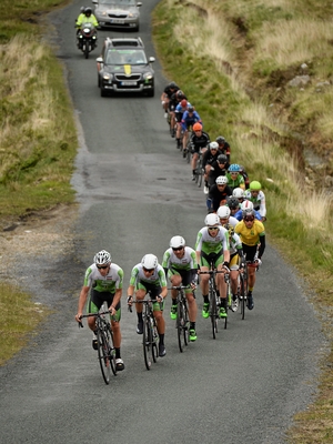 Joshua Edmondson of An Post Chain Reaction is followed by team-mates, Aaron Gate, evenual stage 4 winner Aidis Kruopis, and Conor Dunne