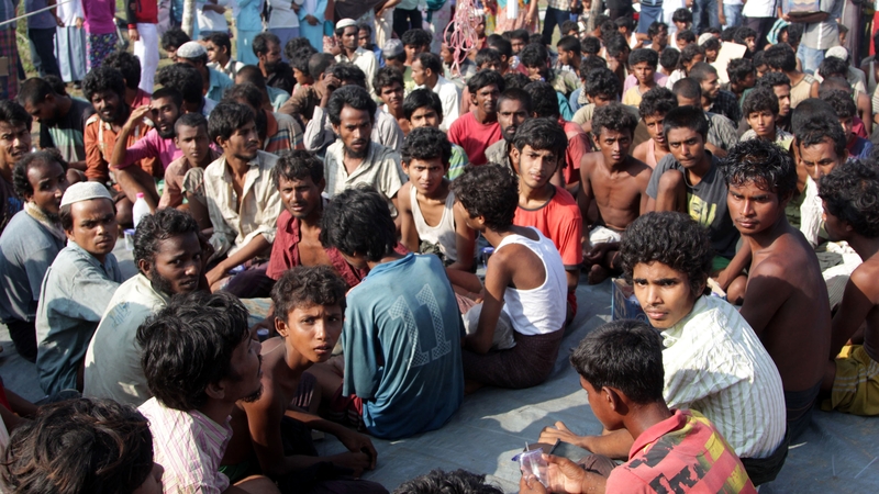 Refugees from Myanmar and Bangladesh are seen in a camp after their rescue in Sumatra, Indonesia