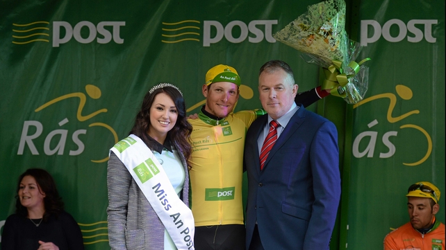 An Post Rás leader Lukas Postlberger poses with Miss An Post Rás Donna McCaffrey and Finbar Langan
