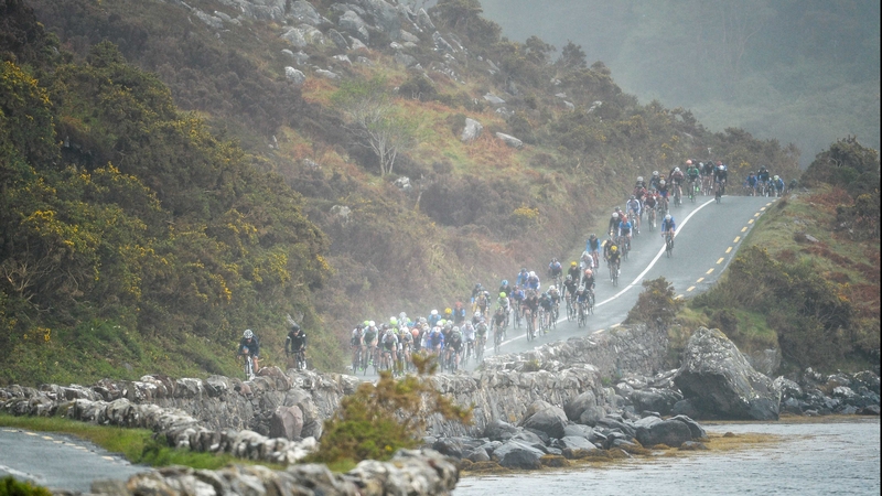 The peleton weaves its way along the picturesque Mayo coastline