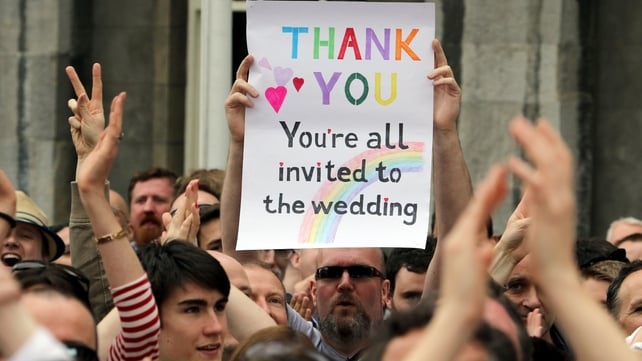 Save the date - the crowd reacts after the result of the same-sex marriage was announced at Dublin Castle