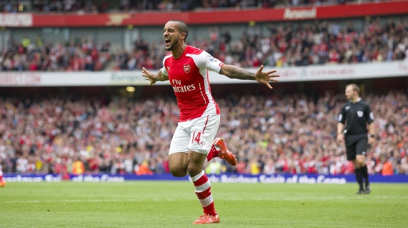 Theo Walcott celebrates after scoring Arsenal's second goal