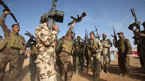 Iraqi fighters pictured near the village of Nukhayb in Anbar province