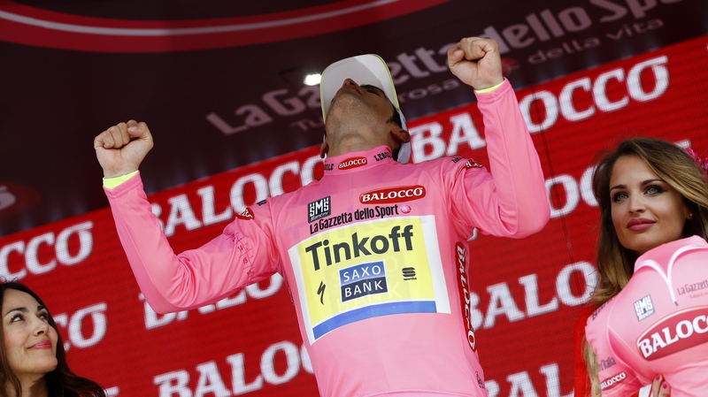Spanish rider Alberto Contador celebrates after the stage