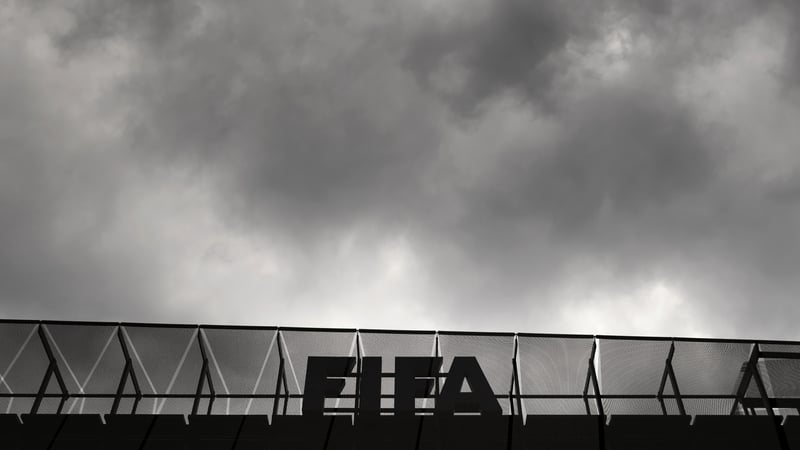 A FIFA logo is seen at the top of its headquarters in Zurich on Wednesday