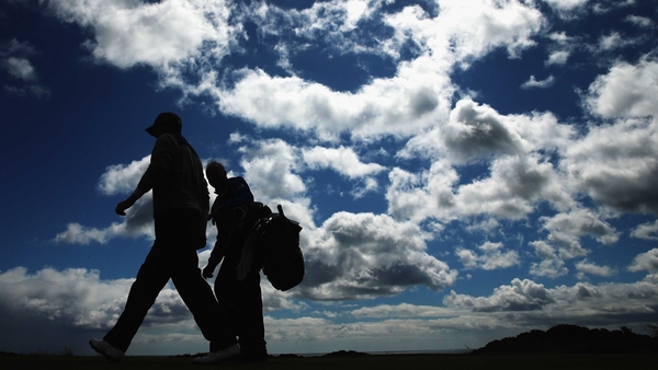 Blue skies were at Royal County Down but the wind was up and lots of rain fell on the opening day of the Irish Open
