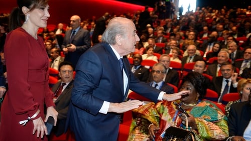 FIFA President Joseph Blatter (C) and his girlfriend Linda Gabrielian (L) arrive for the opening ceremony of the FIFA Gongress