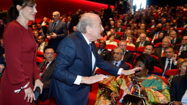 FIFA President Joseph Blatter (C) and his girlfriend Linda Gabrielian (L) arrive for the opening ceremony of the FIFA Gongress