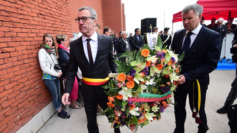 The mayor of Brussels, Yvan Mayeur, lays a wreath at the stadium