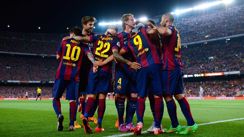 Barcelona players celebrate en route to beating Athletic Bilbao in the Copa del Rey final