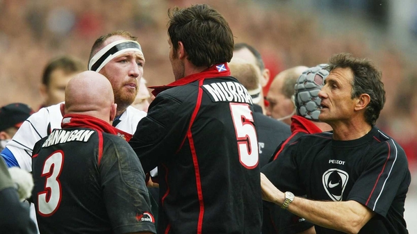 Guy Noves (r) helps out Trevor Brennan back in 2004