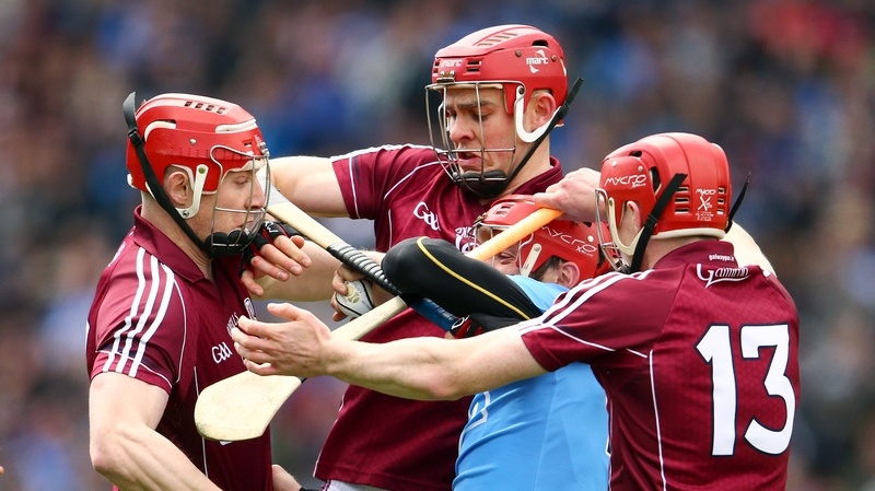 Dublin's Ryan O'Dwyer is tackled by Joe Canning, Jonathan Glynn and Cathal Mannion of Galway during the Leinster hurling quarter-final clash at Croke Park