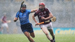 Shane Durkin of Dublin with Cathal Mannion of Galway had to battle the elements at Croke Park