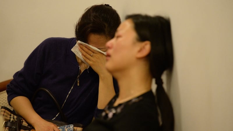 Relatives wait for word on their loved ones