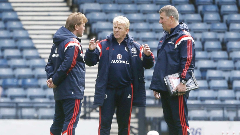 Mark McGhee (R) and the Scotland management team guided their charges to a 1-0 win against Qatar on Friday