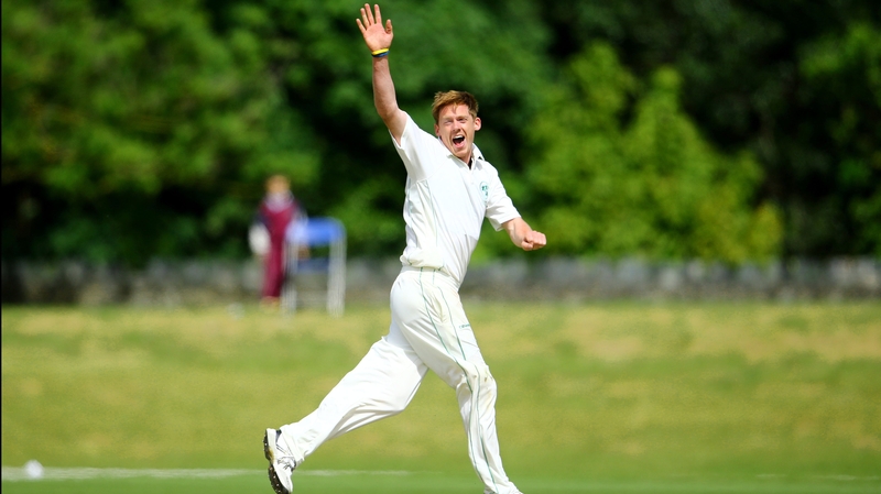 Craig Young celebrates taking a wicket