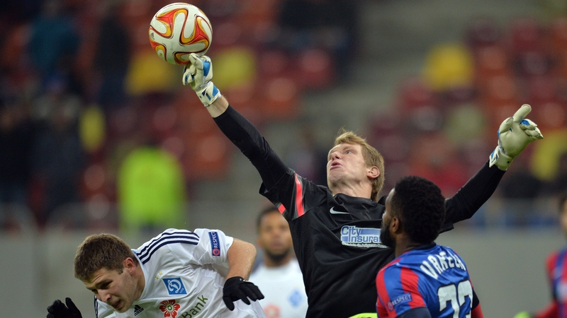 Giedrius Arlauskis punches clear during a Europa League match