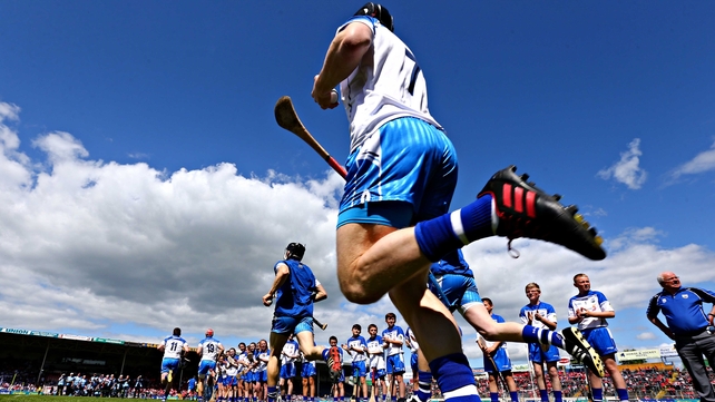 Waterford players make their way out onto the pitch for the start of the match against Cork