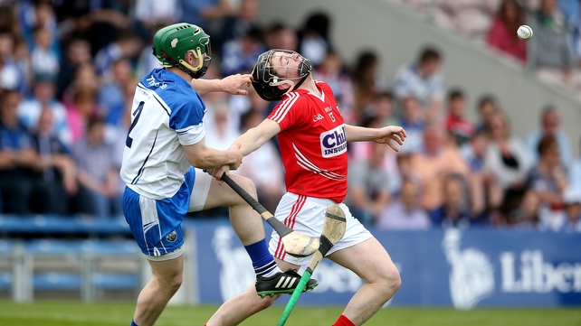 Suspicion of a tug on the helmet from Waterford’s Eoin Madigan on Noel McNamara of Cork during the Munster IHC semi-final