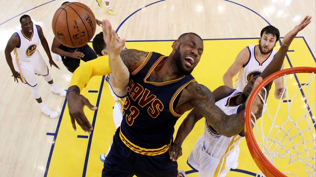 LeBron James of the Cleveland Cavaliers tangles with Klay Thompson of the Golden State Warriors during game one of the NBA Finals