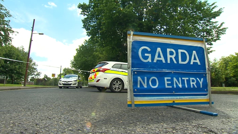 A gunman dressed as a woman walked into a local youth project and shot Mr Walker in the head