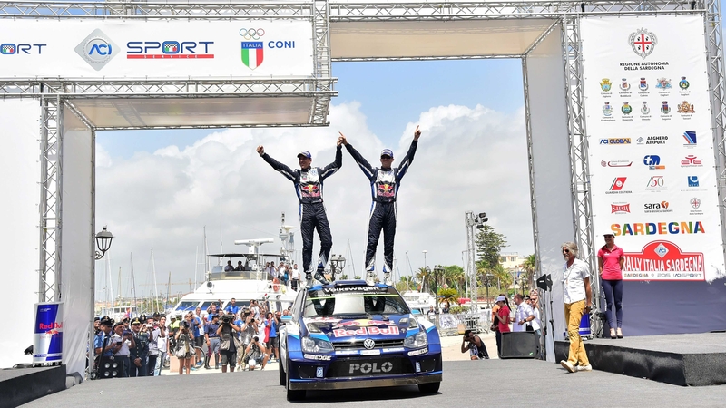 Sebastien Ogier and co-driver Julien Ingrassia celebrate victory in Sardinia