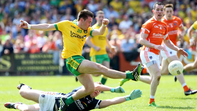 Donegal's Martin O'Reilly scores their second goal past Armagh goalkeeper Mathew McNeice