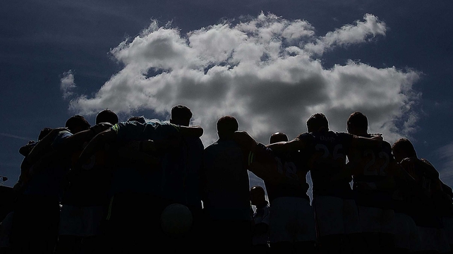 The Tipp footballers huddle before the game against the All-Ireland champions