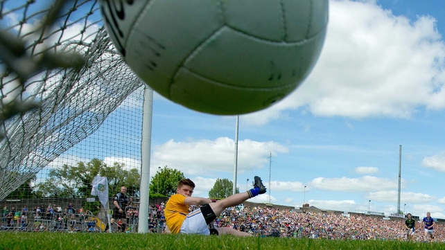 Back of the net - Wicklow goalkeeper Robert Lambert is beaten from the penalty spot by Meath's Andrew Tormey