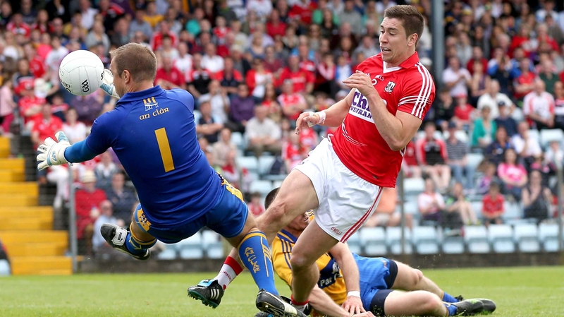 Cork’s Conor Dorman has his shot saved by goalkeeper Joe Hayes of Clare