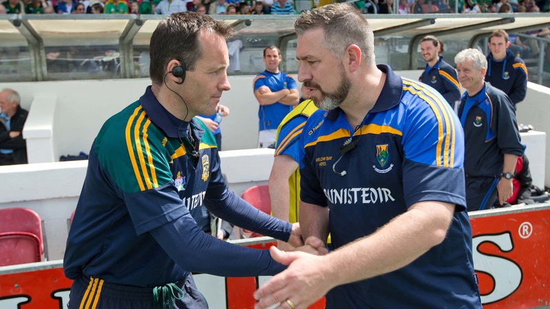Meath manager Mick O'Dowd shakes hands with Wicklow manager Johnny McGee