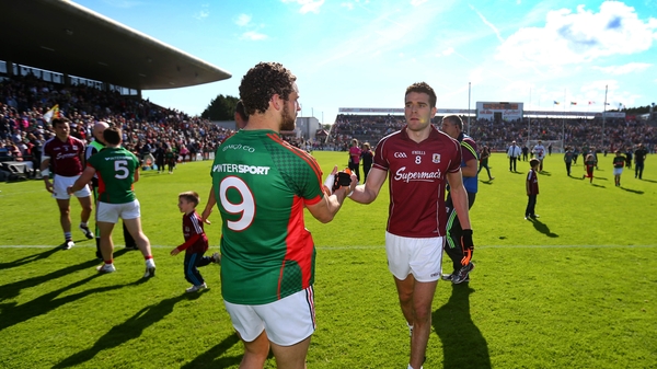 Galway’s Fiontán Ó Curraoin and Tom Parsons of Mayo shake hands after the Salthill clash