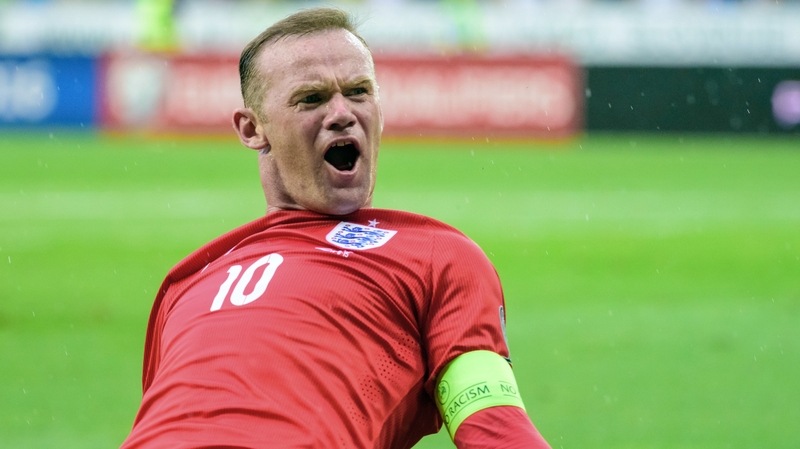Wayne Rooney celebrates after scoring England's winner in Slovenia