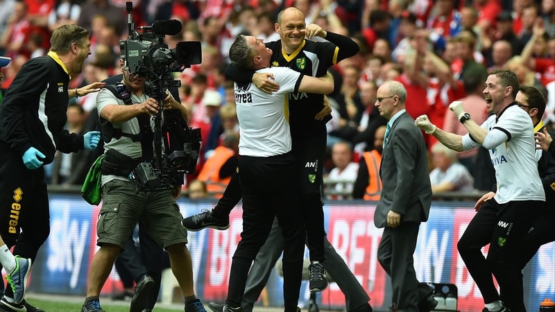 Alex Neil celebrates with his staff after the final whistle of the English Championship play-off final against Middlesbrough at Wembley