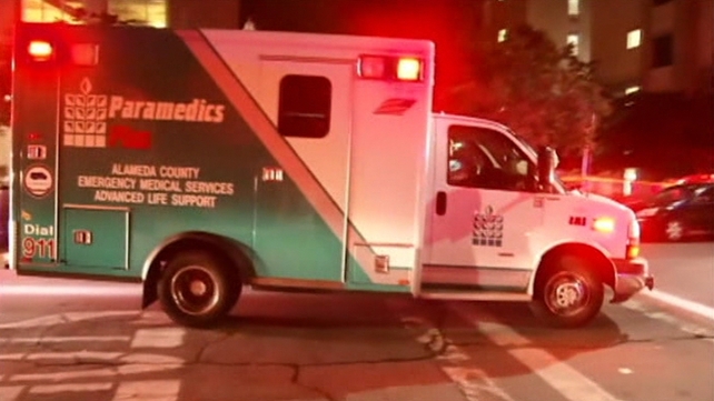 An ambulance leaves the scene