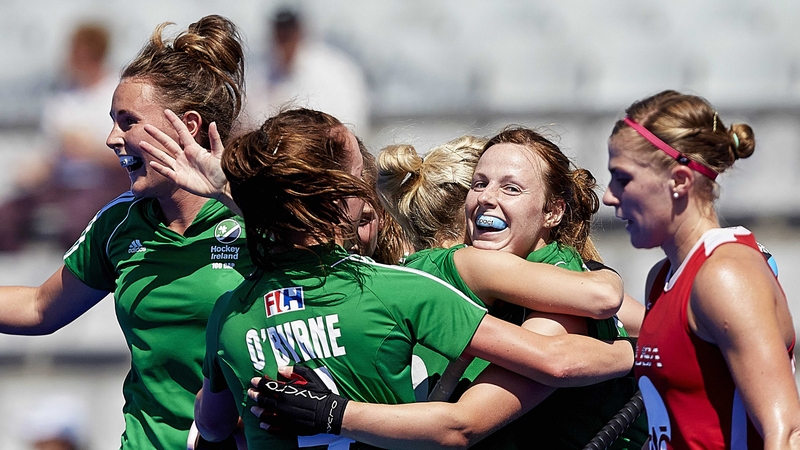 Megan Frazer and the Ireland players congratulate Anna O’Flanagan on scoring their second goal