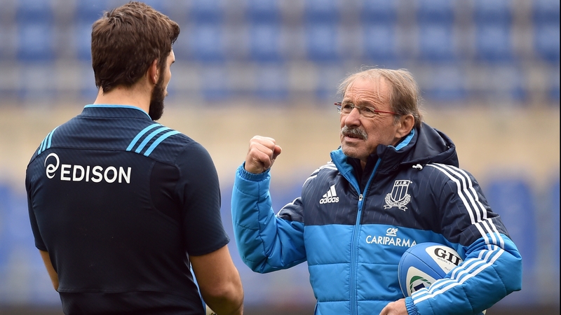 Italy coach Jacques Brunel (R) is caught in the middle of the dispute between players and officials