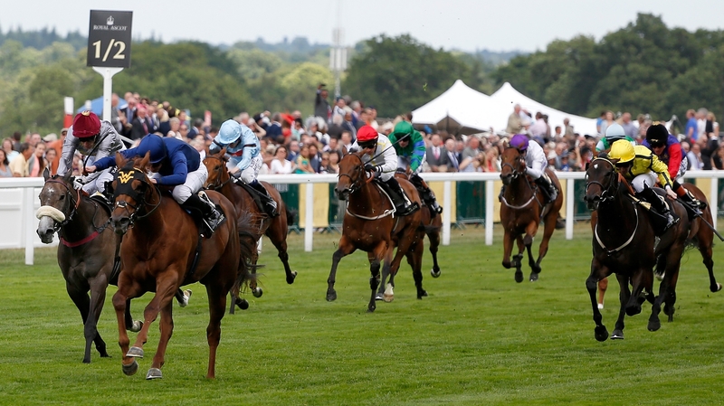 Acapulco (in blue) comes home to win the Queen Mary Stakes
