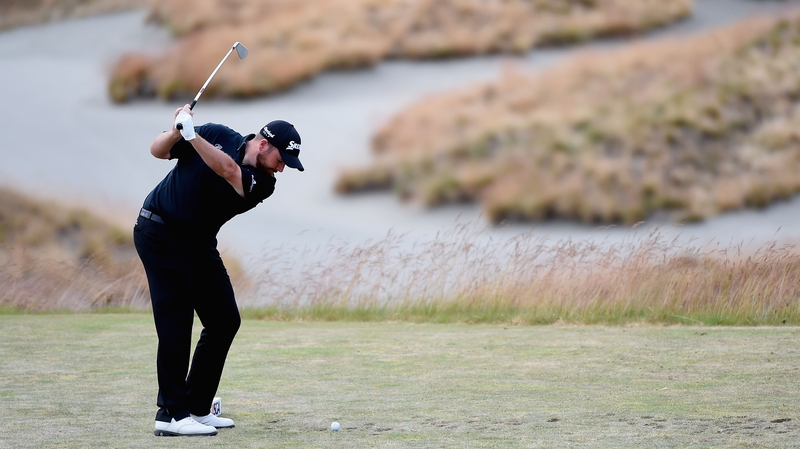 Shane Lowry hits his tee shot on the third hole during the first round of the 115th US Open