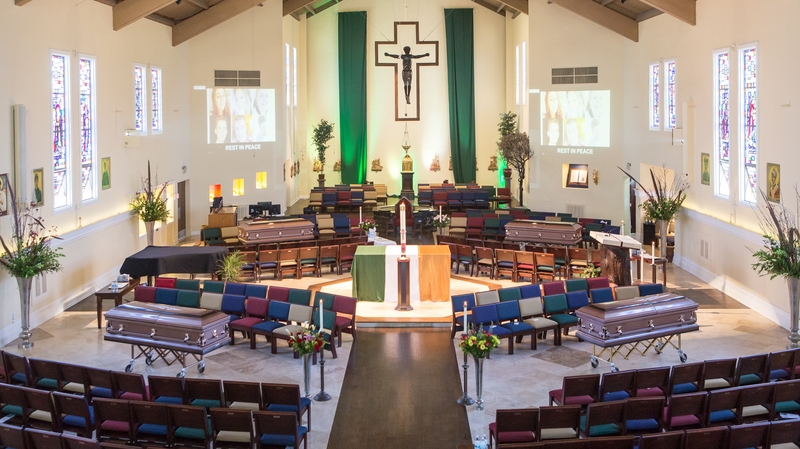 Last night relatives of four of the students who were killed received their bodies at a joint service in St Columba's Church in nearby Oakland