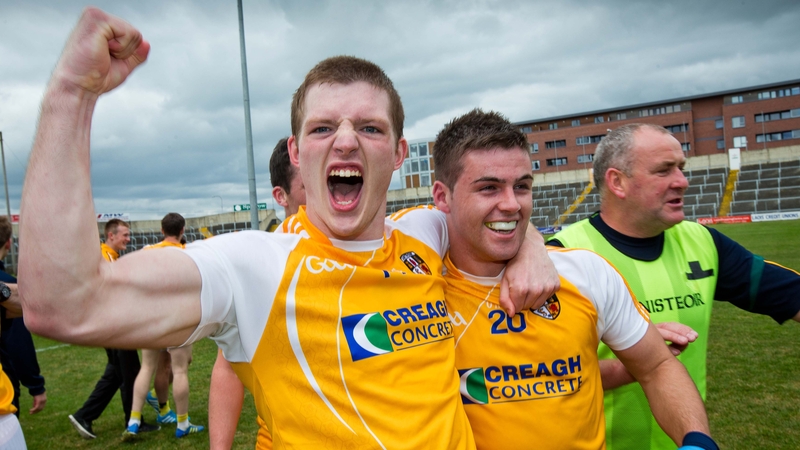 Antrim's Owen Gallagher and Patrick McBride celebrate their victory at the final whistle