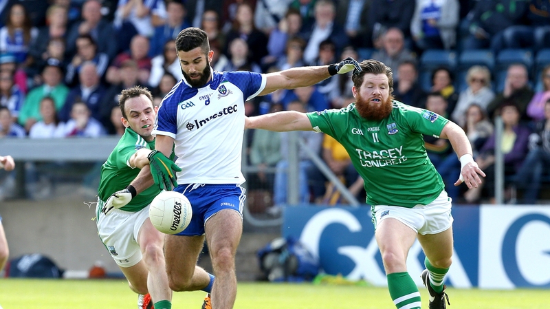 Paul McCusker and Ciaran Flaherty of Fermanagh tackle Neil McAdam of Monaghan