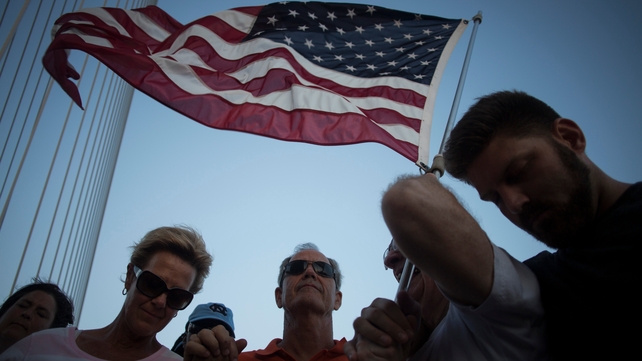 Participants observed nine minutes of silence - one minute for each victim