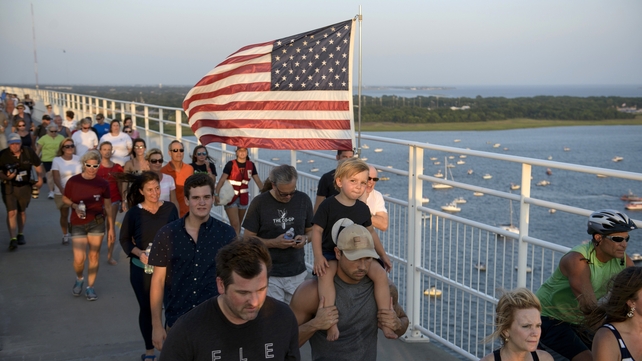 The march took place yesterday across the Arthur Ravenel Jr Bridge in Charleston