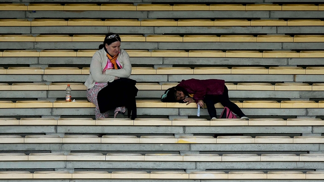 A young Kilkenny supporter takes a break during the Kilkenny v Laois Leinster Minor Hurling Championship semi-final on Sunday