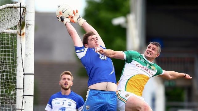Waterford goalkeeper Seán Barron under pressure from Offaly's Niall Smyth during their qualifer clash on Saturday